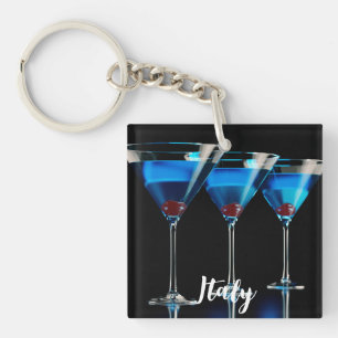 Porte-clefs Trois cocktails bleus avec cerise sur noir