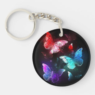 Porte-clefs Trois papillons brillants sur l'arrière - plan de 