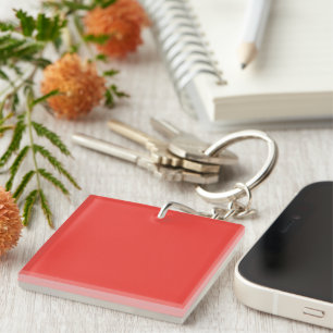 Porte-clefs un arrière - plan rouge avec une bordure blanche