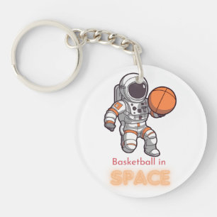 Porte-clefs Un astronaute joue au basket-ball dans l'espace
