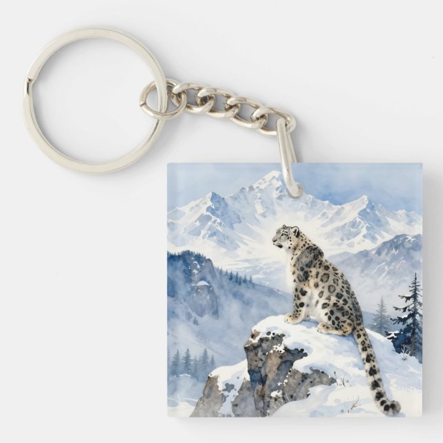Porte-clefs Un léopard des neiges sur un pic enneigé (Devant)