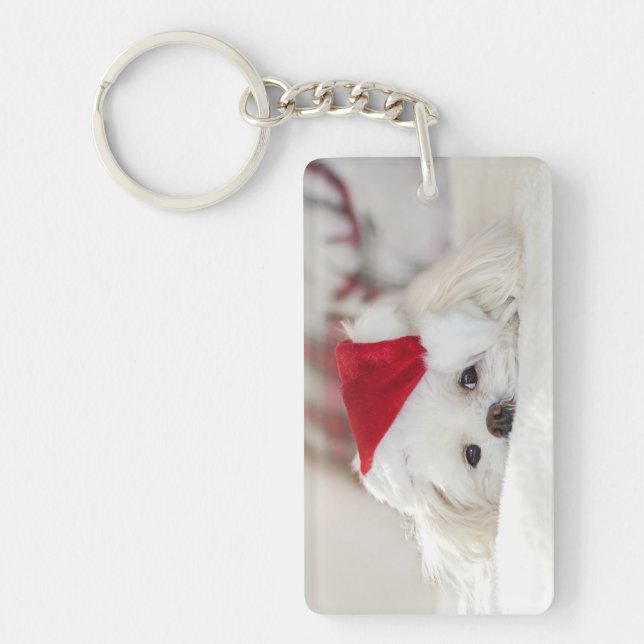 Porte-clefs Un mignon chien blanc dans un Casquette de Noël ro (Devant)