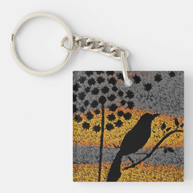 Porte-clefs Un oiseau parmi les plumes (Devant)