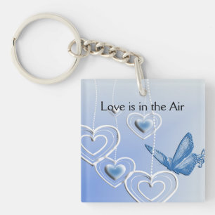 Porte-clefs Un papillon et des cœurs