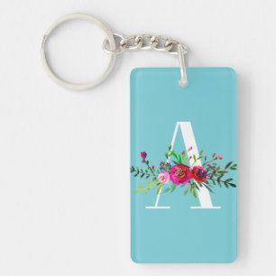 Porte-clefs Une lettre initiale monogramme floral couleur pers