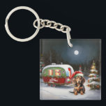 Porte-clefs Winter Dachshund Caravan Christmas Adventure<br><div class="desc">Laissez-vous tenter par la magie d'une nuit d'hiver enneigée alors qu'une caravane glisse gracieusement à travers le paysage illuminé par la lune. La beauté sereine de la neige scintillante et l'éclat enchanteur de la lune créent une scène captivante, promettant une aventure de Noël inoubliable remplie de chaleur, de joie et...</div>