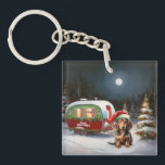 Porte-clefs Winter Dachshund Caravan Christmas Adventure<br><div class="desc">Laissez-vous tenter par la magie d'une nuit d'hiver enneigée alors qu'une caravane glisse gracieusement à travers le paysage illuminé par la lune. La beauté sereine de la neige scintillante et l'éclat enchanteur de la lune créent une scène captivante, promettant une aventure de Noël inoubliable remplie de chaleur, de joie et...</div>