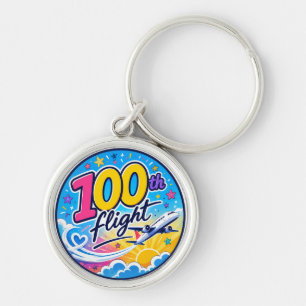 Porte-clés 100ème vol avion coloré voyage souvenir