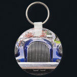 PORTE-CLÉS 1998 MORGAN<br><div class="desc">ALL ORIGINAL 1998 BRITISH IMPORT MORGAN. Two seater spots car,  convertible,  spoke rims,  saddle interior,  real wooden trunk roadster fully original not restored. Classic British racing car with Royal candy apple blue metallic paint. Fleetphoto</div>