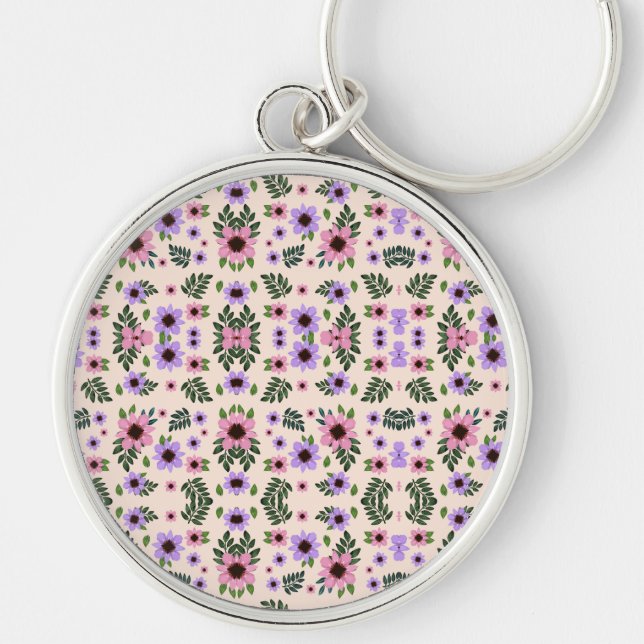 Porte-clés A round keychain featuring a vibrant floral  (Devant)