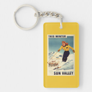 Porte-clés affiche de sourire et de ski de femme
