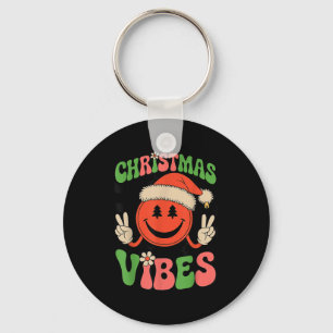 Porte-clés Ambiance de Noël Groovy visage souriant chapeau de