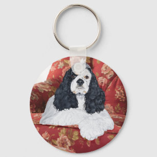 Porte-clés American Cocker Spaniel sur Chaise Rouge