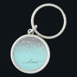 Porte-clés Aqua bleu Turquoise Parties scintillant argent Mon<br><div class="desc">Aqua Blue - Turquoise et Silver Sparkle Parties scintillant Script Monogramme Nom Keychains (Porte - clé). Cela rend le cadeau parfait pour 16 ans,  mariage,  douche nuptiale,  anniversaire,  baby shower ou bachelorette pour quelqu'un qui aime le luxe glam et les styles chic.</div>