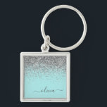 Porte-clés Aqua bleu Turquoise Parties scintillant argent Mon<br><div class="desc">Aqua Blue - Turquoise et Silver Sparkle Parties scintillant Script Monogramme Nom Keychains (Porte - clé). Cela rend le cadeau parfait pour 16 ans,  mariage,  douche nuptiale,  anniversaire,  baby shower ou bachelorette pour quelqu'un qui aime le luxe glam et les styles chic.</div>
