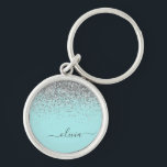 Porte-clés Aqua Blue Teal Argent Paillettes Monogramme<br><div class="desc">Aqua Blue - Teal et Argent Paillettes Glitter Monogramme Nom Porte-Clés (Porte-Clé). C'est le cadeau idéal pour un anniversaire sweet 16, un mariage, une douche de mariée, un anniversaire de mariage, une baby shower ou une soirée enterrement de vie de jeune fille pour quelqu'un qui aime le luxe glamour et...</div>