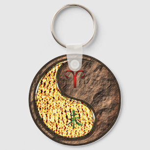 Porte-clés Aries et la chèvre de la Terre