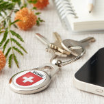 Porte-clés Armoiries de Suisse | Drapeau Suisse<br><div class="desc">Armoiries de Suisse | Porte - clé du pavillon suisse. Doté de l'emblématique armoiries suisses, avec la croix blanche sur un arrière - plan rouge. Le design est audacieux et saisissant, ce qui en fait l'ajout parfait à votre vie. Fait un grand cadeau à toute personne qui aime la Suisse...</div>