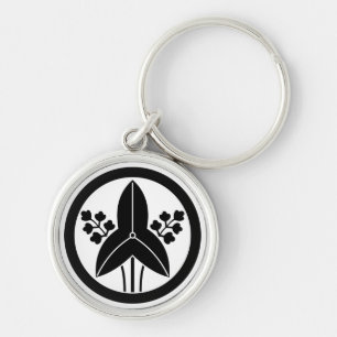 Porte-clés Arrowhead debout dans un porte - clé circulaire