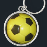 Porte-clés Art de football (soccer) jaune et noir vibrant<br><div class="desc">Art de football vibrant jaune et noir</div>