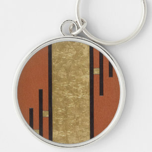 Porte-clés Art Déco en or et beige