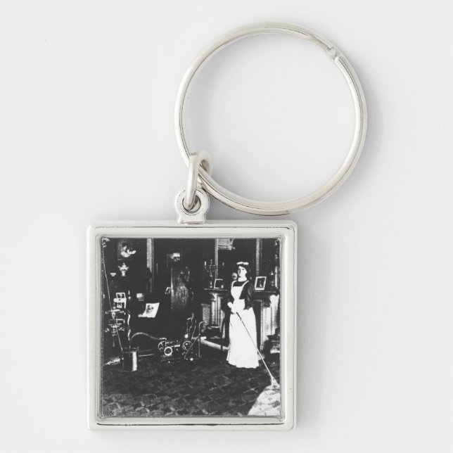 Porte-clés Aspirateur au travail (Devant)