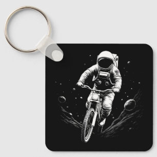 Porte-clés Aventure spatiale en vélo astronaute cosmique