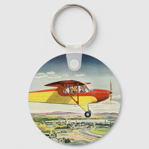 Porte-clés Avion de transport vintage sur champs agricoles