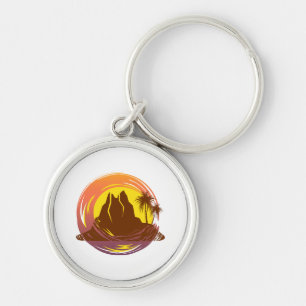 Porte-clés Badge avec paysage volcanique tropical et palmiers
