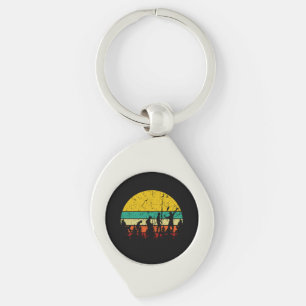 Porte-clés Badminton Evolution Retro Joueur Badminton