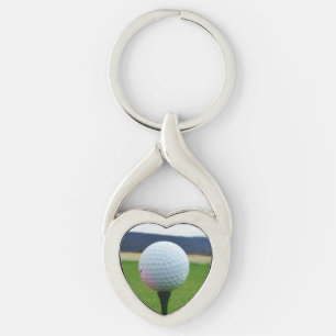 Porte-clés Bal de golf blanc sur un terrain de golf de montag