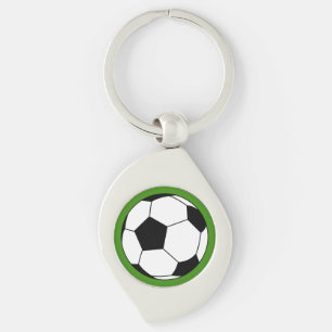 Porte-clés Ballon de football noir et blanc sur fond vert