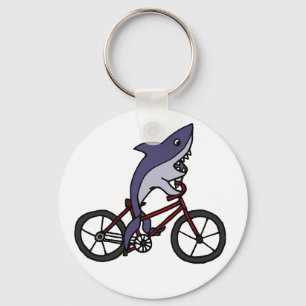 Porte-clés Bande dessinée idiote de bicyclette d'équitation