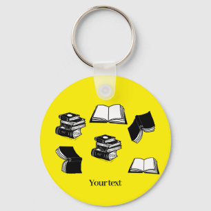 Porte-clés Bibliophile livresque jaune motif de livre de bibl