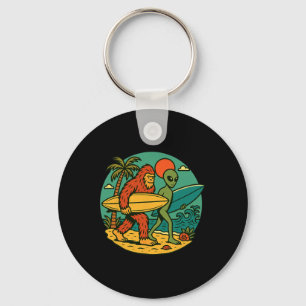 Porte-clés Bigfoot et alien surfant sur l'art de plage vintag