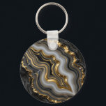 Porte-clés Black Gold Agate Geode Luxury Marble<br><div class="desc">Mesmerizing black and charcoal agate with flowing bands of soft gray and creamy white,  dramatically framed and veined in molten liquid gold. This opulent,  high-contrast geode design exudes modern luxury,  sophistication and powerful elegance perfect for those who love dark,  glamorous mineral aesthetics.</div>