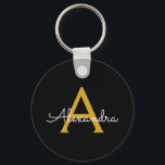 Porte-clés Black Gold Modern Script Girl Monogramme Nom<br><div class="desc">Noir et or Simple Script Monogramme Nom Clés (Porte - clé). Cela rend le cadeau parfait pour 16 ans,  mariage,  douche nuptiale,  anniversaire,  baby shower ou bachelorette pour quelqu'un qui aime le luxe glam et les styles chic.</div>