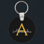 Porte-clés Black Gold Modern Script Girl Monogramme Nom<br><div class="desc">Noir et or Simple Script Monogramme Nom Clés (Porte - clé). Cela rend le cadeau parfait pour 16 ans,  mariage,  douche nuptiale,  anniversaire,  baby shower ou bachelorette pour quelqu'un qui aime le luxe glam et les styles chic.</div>