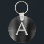 Porte-clés Black Modern Faux Stainless Steel Monogram<br><div class="desc">Modern and Elegant Black Faux Stainless Steel Metallic Elegant Keychain. These Keychains can be customized to include your initial and first name. These key chains make great birthday,  bridal shower or bachelorette party favors.</div>