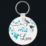 Porte-clés Blue Love Birds<br><div class="desc">This key chain features two birds with blue accents and a tree branch with matching blue leaves and the word Love.</div>