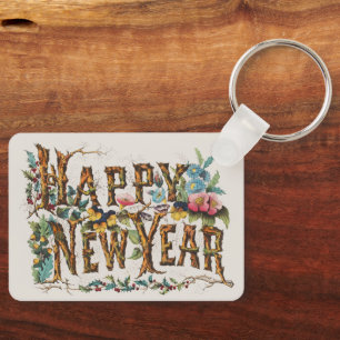 Porte-clés Bonne année dans les troncs d'arbres, les Acornes 