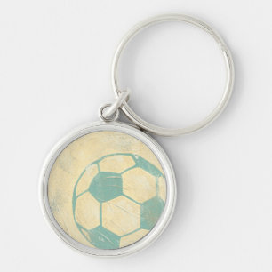 Porte-clés Boule de soccer bleu Pastel par Chariklia Zarris