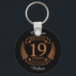 Porte-clés Bronze traditional wedding anniversary 19 years<br><div class="desc">A design to celebrate 19 years of marriage. This design has a bronze colored laurel design on a black background. Bronze is the traditional gift for this occasion. The text reads bronze 19 years anniversary. A romantic design to celebrate your 19th year of marriage. If you would like any help...</div>