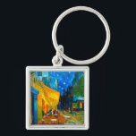 Porte-clés Café Van Gogh Terrasse en soirée<br><div class="desc">Porte - clé présentant la peinture à l’huile de Vincent van Gogh Café Terrace at Night (1888). Des étoiles jaunes peignent le ciel bleu nuit au-dessus d'un café en plein air en France. Un merveilleux cadeau pour les amateurs de post-impressionnisme et d'art hollandais.</div>
