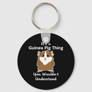 Porte-clés C'est un chien de Guinée
