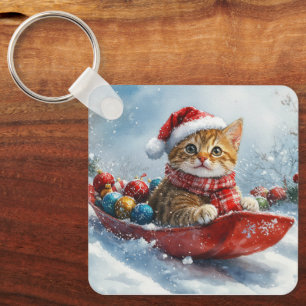 Porte-clés Chat Abyssin en traîneau Laissez neige Noël