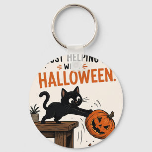 Porte-clés Chat noir drôle renversant un citrouille Halloween