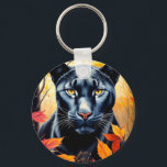Porte-clés Chat noir Feuilles d'automne Porte - clé de peintu<br><div class="desc">Cette oeuvre d'acrylique féline présente un gros chat noir féroce contre un arrière - plan de forêt d'automne, célébrant la saison d'automne et félins de chat sauvage simultanément. Le tableau saisit la beauté et la puissance de la nature avec un jeu de couleurs chaudes, rouge, orange et jaune. Parfait pour...</div>