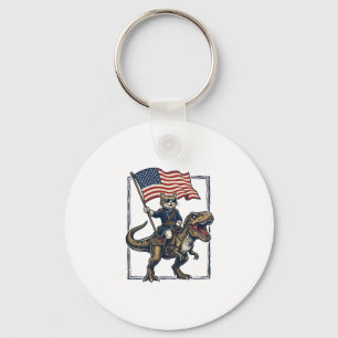 Porte-clés Chat Patriotique à Cheval sur un Dinosaure Design