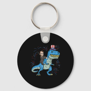 Porte-clés Chemise Abe Lincoln à cheval sur un dinosaure T-re